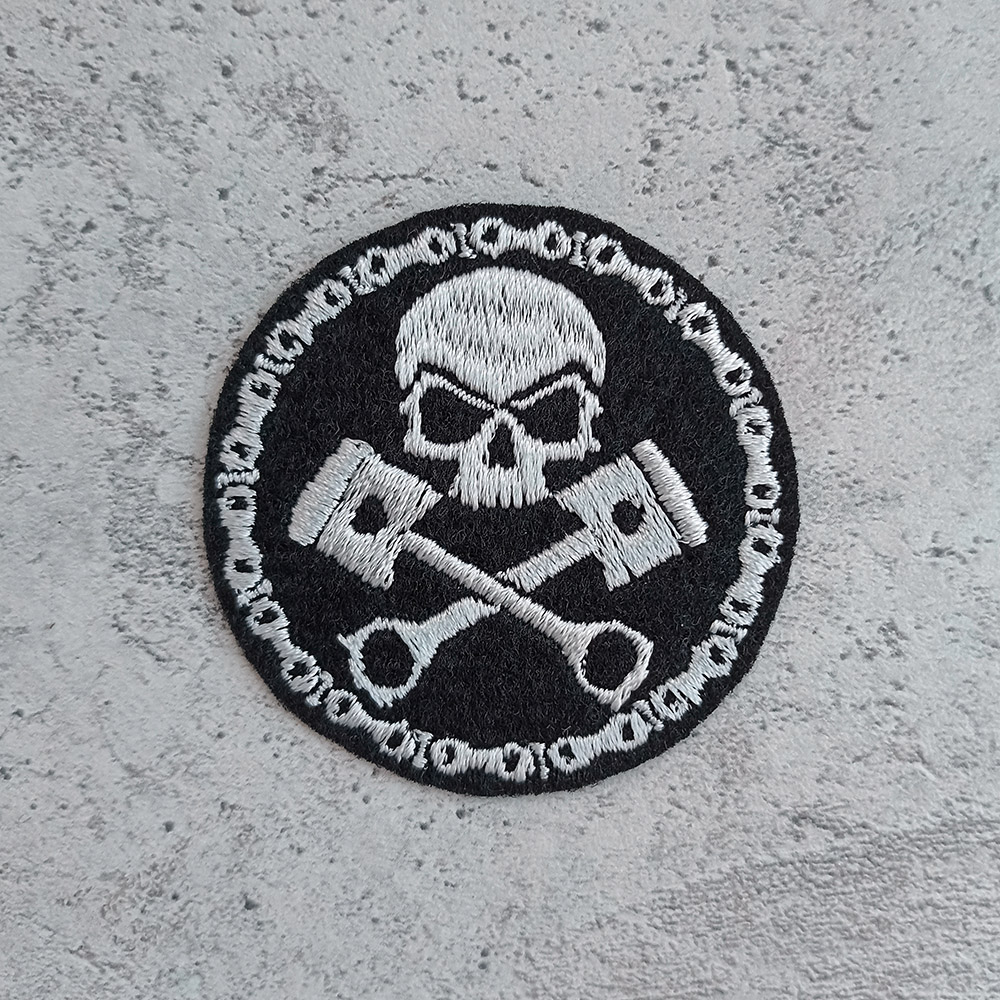 Skull with pistons and motorcycle chain patch Skull with pistons and motorcycle chain patch