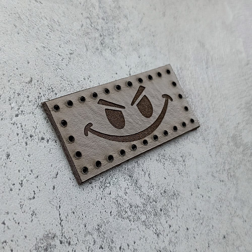 Evil smiley face leather patch Evil smiley face leather patch