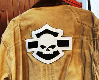 Harley-Davidson logo patch with Willie J.'s skull on the back of the jacket