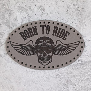 Born to ride, skull in a helmet with wings, leather patch