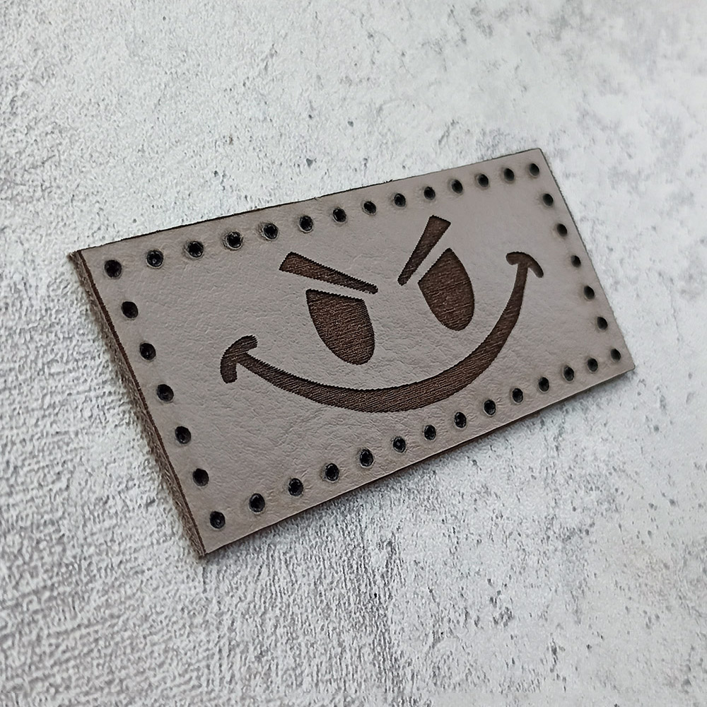 Evil smiley face leather patch Evil smiley face leather patch