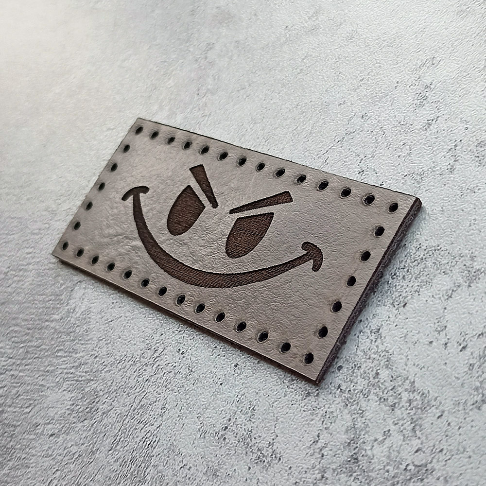 Evil smiley face leather patch Evil smiley face leather patch