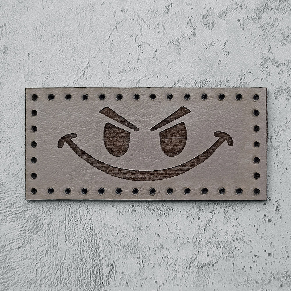 Evil smiley face leather patch Evil smiley face leather patch