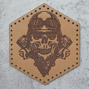 Skull in a helmet, with pistons and wrenches leather patch