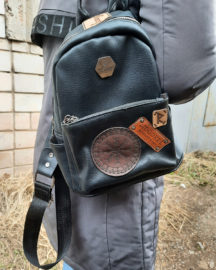 Aegishjalmur's Helm of Terror leather patch with runes on a backpack