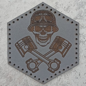 Skull in a helmet with pistons leather patch