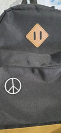 A Pacific patch, the international peace symbol, for a backpack.