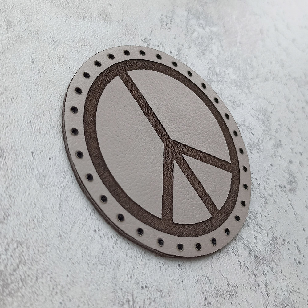 The Pacific, the international symbol of peace, leather patch The Pacific, the international symbol of peace, leather patch