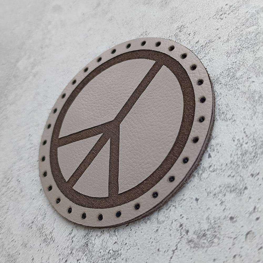 The Pacific, the international symbol of peace, leather patch The Pacific, the international symbol of peace, leather patch