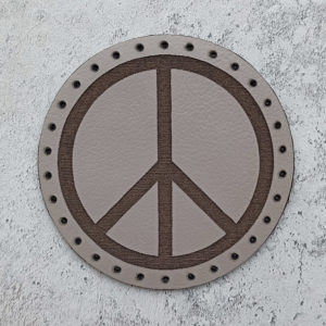 The Pacific, the international symbol of peace, leather patch