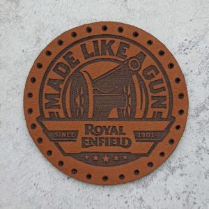 Royal Enfield, Made like a gun, since 1901, leather patch