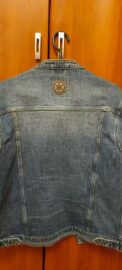 Leather Yamaha logo patch on the back of a denim jacket
