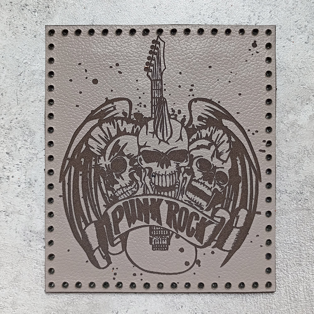 Punk Rock, three skulls with a guitar and wings, leather patch Punk Rock, three skulls with a guitar and wings, leather patch