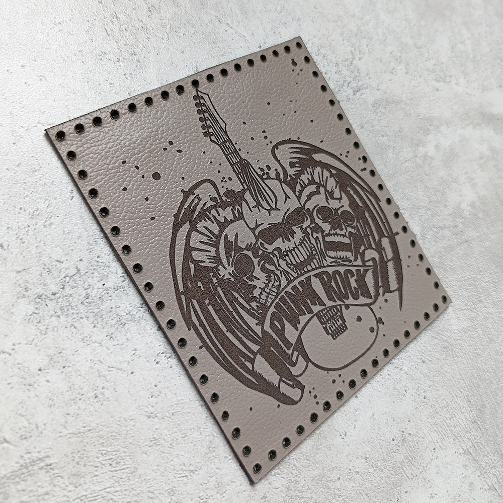Punk Rock, three skulls with a guitar and wings, leather patch Punk Rock, three skulls with a guitar and wings, leather patch